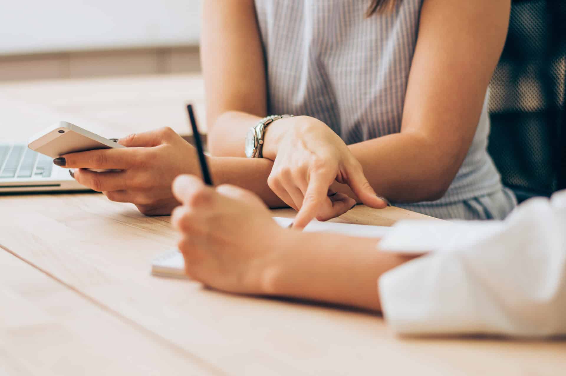 Two Women Collaborating on Writing Project